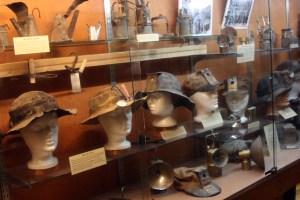 Progression of miner's hats and lamps.