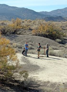 Collecting samples at the settling ponds near Elberta