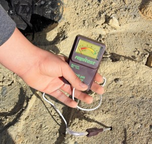 Testing the soil around the Swansea mine dump. The pH is very low, under 3.0.