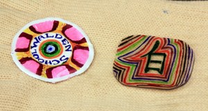 Shrinky dinks. The disk on the left was a #6 recyclable plastic cup colored by Sharpie permanent markers, then heated in a toaster oven. It shrank down to its original size before plastic forming.