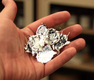 Tin splotches, made by dripping melted tin onto a steel plate.