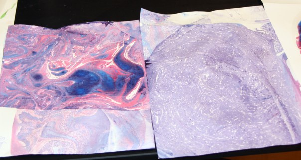 Purple marble patterns, lifted from the same paint layer.
