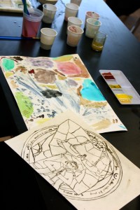 Alec's Anime drawing. Behind it are pigments we made for watercolors. Stay tuned for that post!