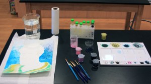 Adding green robes made from a mixture of lemon yellow with cobalt blue and yellow ochre with Prussian blue.