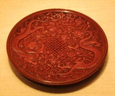 Chinese red lacquerware box colored with Chinese red, or cinnabar.