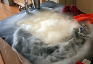 A demonstration of dry ice in water with soap solution.