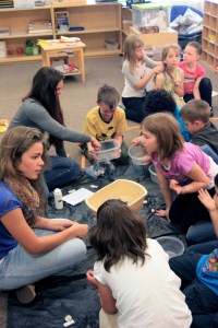 Elena presenting magnetism to an elementary class at Walden School.
