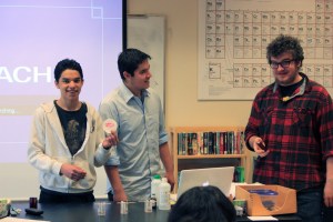 Elijah and Ben demonstrate how to use lip prints in forensic science, with some help from Joshua.