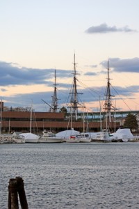The masts of the U.S.S. Constitution, looking across the Charles River and Boston Harbor to Charlestown.