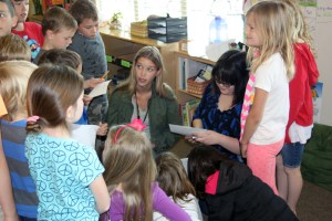 Savannah and Emily present at the elementary school