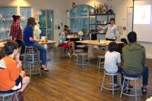 Teresita and Savannah demonstrate how hair analysis is used in forensic science.