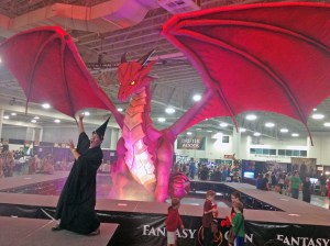 Yours Truly being attacked by a dragon. It was modeled in 3D on a computer and cut out of foam with a milling machine at Adonis Bronze