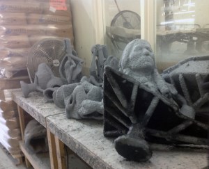 Cement-sand-clay slurry casts with wax inside. Notice the sprues that distribute the bronze once the wax is melted out.