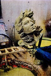 Coating the wax with a ceramic slurry to make a negative mold.