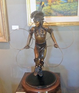 Hoop Dancer, a bronze statue on display at Adonis Bronze