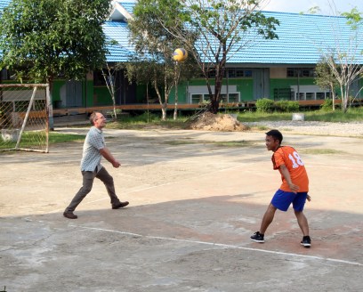 Craig playing volleyball