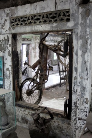Ruined bike in window
