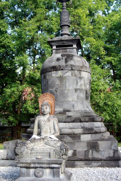 Seated Buddha with bronze head