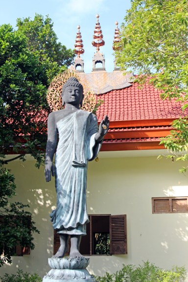 Standing Buddha-red temple