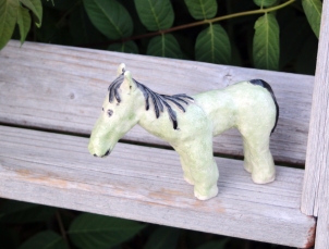 Green horse on steps-s